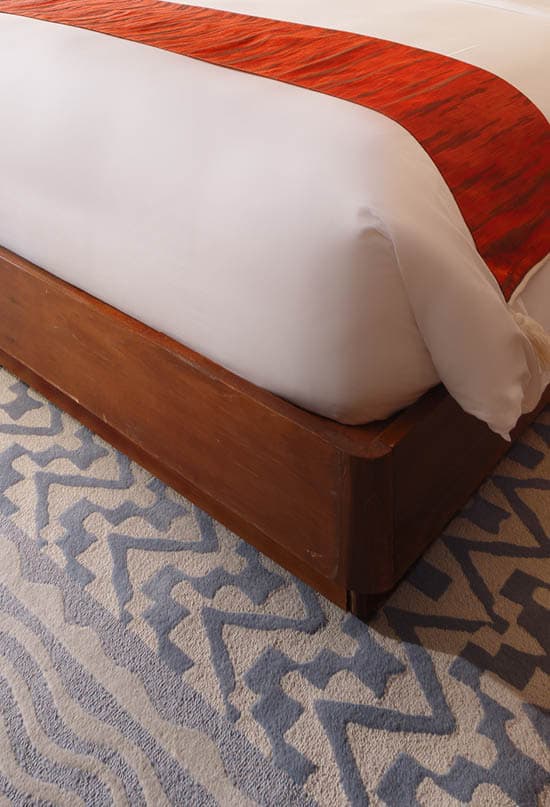 Custom carpet detail in the Kasara Suite