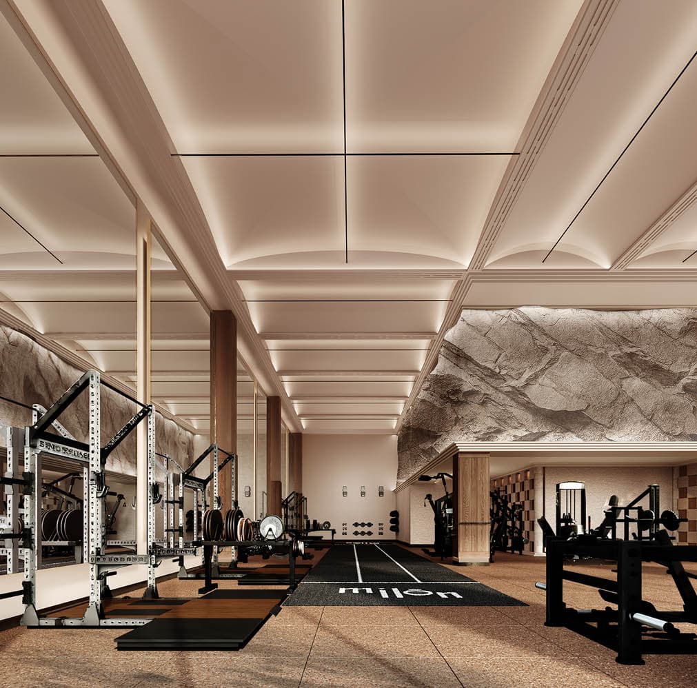 Gym training floor with rock walls and vaulted lighting