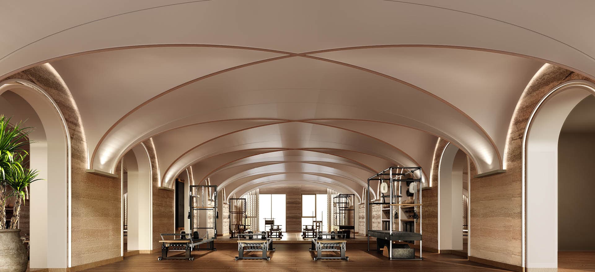 Pilates studio under a sequence of Romanesque vaults