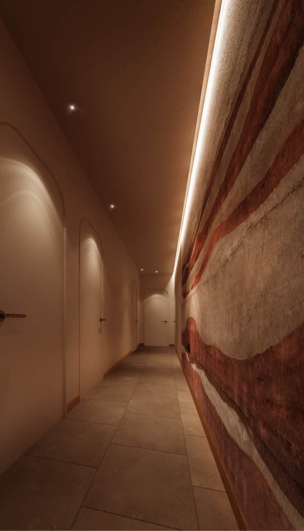 Warm spa corridor with an earth-toned mural