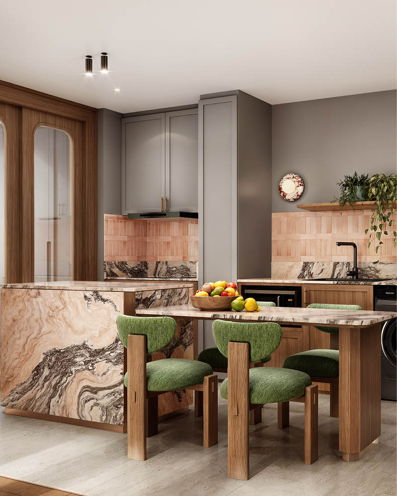 Kitchen island in swirling pink marble with green bouclé chairs
